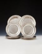A SET OF FOURTEEN FRENCH EMPIRE SILVER PLATES