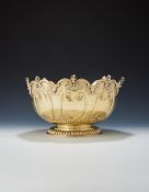 A WILLIAM III SILVER GILT MONTEITH