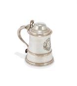 A GEORGE III SILVER TANKARD