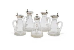 A GROUP OF FIVE SILVER MOUNTED WHISKEY NOGGINS