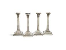A SET OF FOUR VICTORIAN LOADED SILVER CRONITHIAN COLUMN CANDLESTICKS