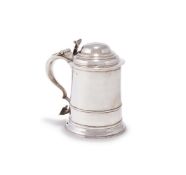 A GEORGE II SILVER TANKARD