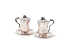 A PAIR OF TURKISH SILVER CUPS, COVERS AND SAUCERS