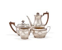 A VICTORIAN SILVER FOUR PIECE HALF LOBED OVAL TEA AND COFFEE SET