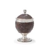 A GEORGE III SILVER MOUNTED COCONUT CUP AND COVER