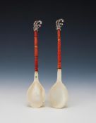 Y TWO MOTHER OF PEARL, CORAL AND DIAMOND SPOONS