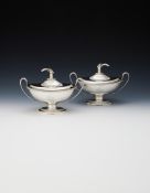 A PAIR OF GEORGE III SILVER SAUCE TUREENS