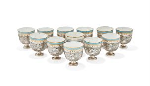 A SET OF TWELVE OTTOMAN SILVER ZARFS