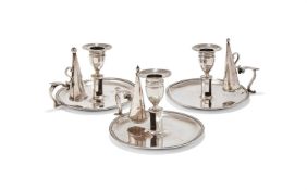 A PAIR OF GEORGE III SILVER CHAMBERSTICKS