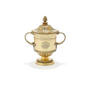 A GEORGE III SILVER GILT CUP AND COVER