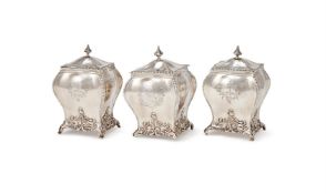A SET OF THREE GEORGE III SILVER TEA CADDIES