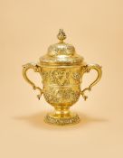 A GEORGE II SILVER GILT CUP AND COVER