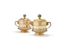 A PAIR OF SILVER GILT PORRINGERS AND COVERS