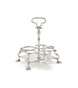 A GEORGE II SILVER WARWICK CRUET STAND