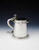 A JAMES II SILVER TANKARD