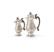 A PAIR OF GERMAN SILVER BALUSTER CHOCOLATE/COFFEE POTS