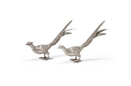 A PAIR OF SPANISH SILVER COLOURED MODELS OF PHEASANTS