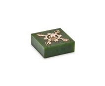 A NEPHRITE AND ROSE GOLD COLOURED BELL PUSH
