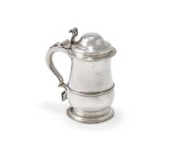 A GEORGE III SILVER BALUSTER TANKARD