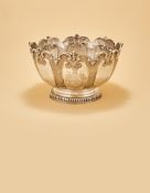 A WILLIAM III SILVER MONTEITH