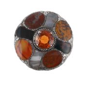 A VICTORIAN SCOTTISH HARDSTONE CIRCULAR BROOCH