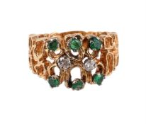 AN EMERALD AND DIAMOND 1970S DRESS RING