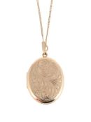 A 9 CARAT GOLD LOCKET PENDANT