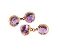 A PAIR OF EARLY 20TH CENTURY AMETHYST CUFFLINKS