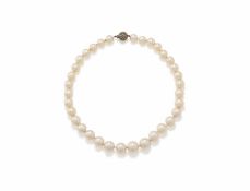 A CULTURED PEARL AND DIAMOND NECKLACE