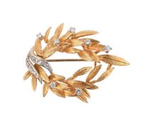 AN 18 CARAT GOLD AND DIAMOND SPRAY BROOCH