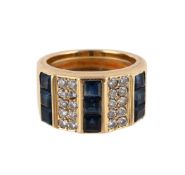 A SAPPHIRE AND DIAMOND BAND RING
