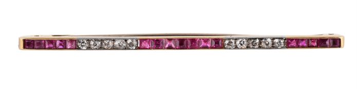 A DIAMOND AND RUBY BAR BROOCH