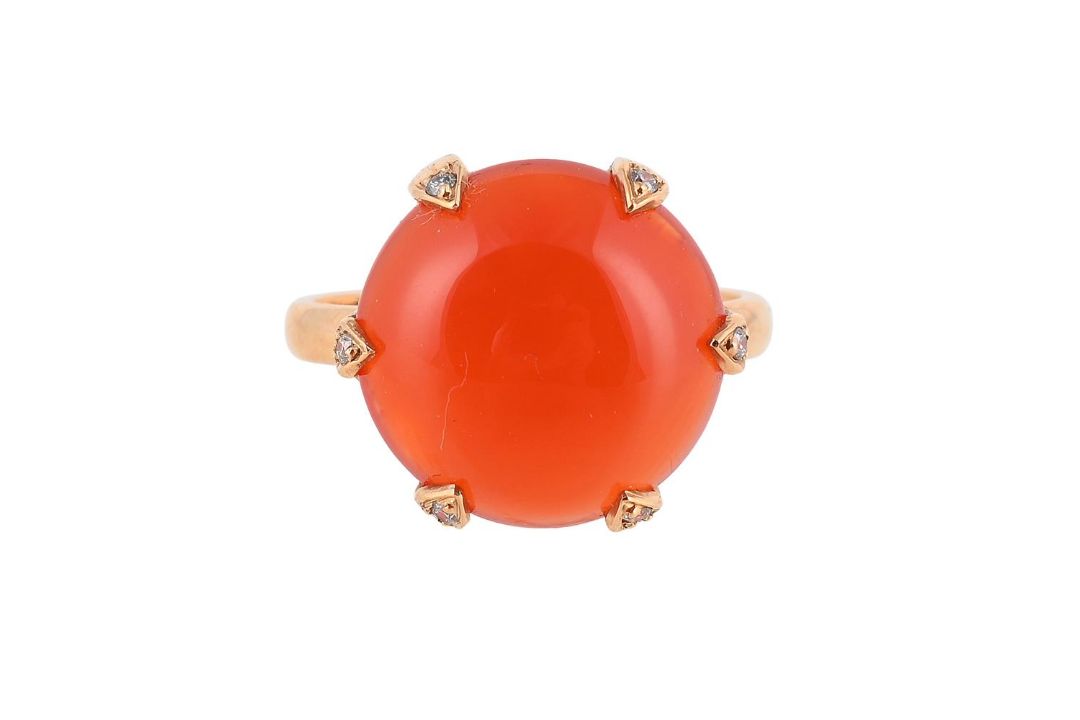 A CORNELIAN AND DIAMOND DRESS RING - Image 1 of 2