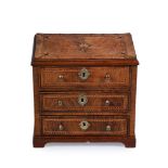 A WALNUT AND INLAID MINIATURE CHEST OF DRAWERS, 19TH CENTURY