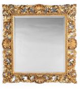 AN ITALIAN CARVED GILTWOOD MIRROR, FLORENCE, 19TH CENTURY