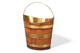 A GEORGE III MAHOGANY AND BRASS BOUND NAVETTE SHAPED BUCKET WITH BRASS LINER, LATE 18TH CENTURY