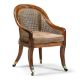 A REGENCY MAHOGANY AND CANED BERGERE ARMCHAIR IN THE MANNER OF GILLOWS, CIRCA 1820 - Image 1 of 2