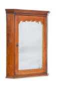 A GEORGE III OAK AND PARCEL GILT CORNER CABINET, LATE 18TH CENTURY