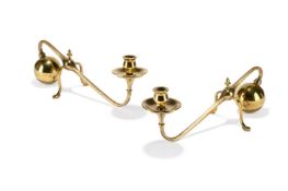 A PAIR OF BRASS CANDLESTICKS, AFTER A DESIGN BY W.A.S. BENSON, LATE 19TH CENTURY