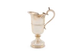 A SILVER PEDESTAL CREAM JUG, HISTORICAL HEIRLOOMS LTD., LONDON 1972