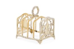 A FRENCH SILVER GILT FOUR DIVISION TOAST RACK, RISLER & CARRE