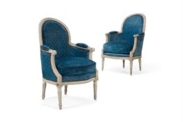 A MATCHED PAIR OF WHITE-PAINTED LOUIS XVI BERGERES