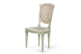 SYRIE MAUGHAM (BRITISH, 1879-1955), A NEO-CLASSICAL STYLE GREEN AND WHITE-PAINTED AND CANED CHAIR