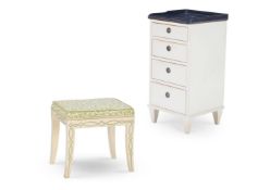 A CREAM PAINTED WOOD AND GILT METAL MOUNTED FOUR DRAWER BEDSIDE CABINET