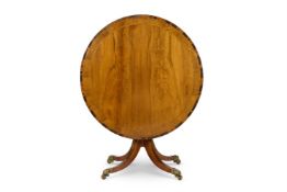 Y A REGENCY ROSEWOOD GILT METAL MOUNTED AND BRASS INLAY TILT TOP CENTRE TABLE
