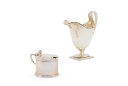 A SILVER HELMET SHAPED CREAM JUG, D. & J. WELLBY LTD., LONDON 1936
