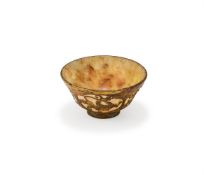 A Chinese gilt bronze decorated marble bowl