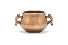 A Chinese bronze twin handled censer
