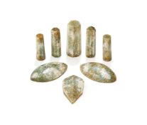 A full set of eight Chinese celadon jade stoppers