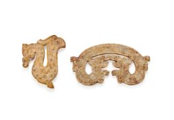 Two Chinese jade 'Dragon' pendants